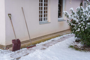 Poorly finished concrete surface showing cracks worsened by winter deicer use